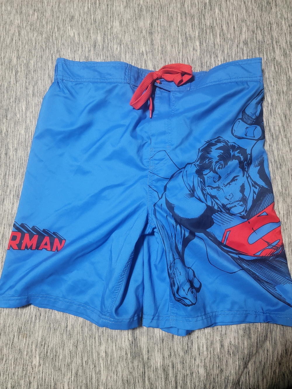 Men’s Bright Blue Superman Swim Shorts with Red Accents